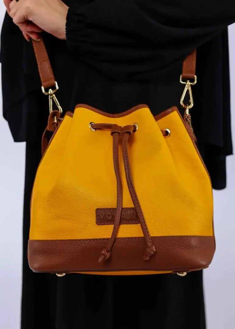 vonajuyellowleatherbucketbag
