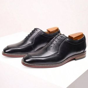 Chaussures Oxford d'affaires faites à la main en cuir véritable