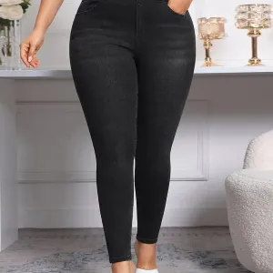 Pantalon skinny extensible en denim noir uni, coupe ajustée