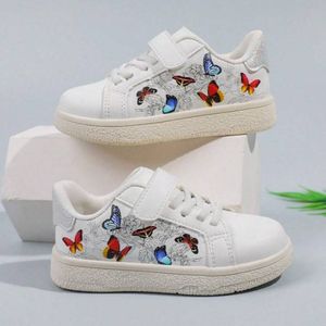 Baskets unisexes blanches à semelle plate et crochet pour enfants