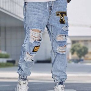 jean-de-jogging-dechire-a-patch-lettre-en-coton