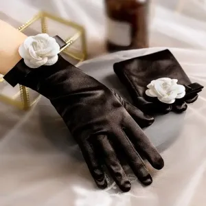 Gants de soirée noirs élégants avec manchette florale