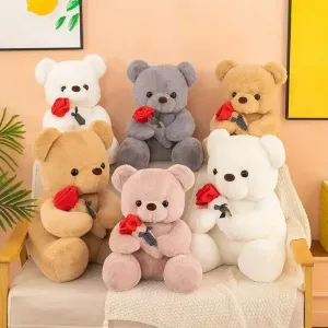 Charmant trio d'ours en peluche avec roses