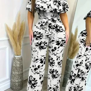 combinaisonfloraleeleganteaepaulesdenudeesetceinture