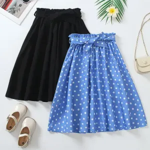 Ensemble deux pièces pour fille comprenant une jupe à pois unie