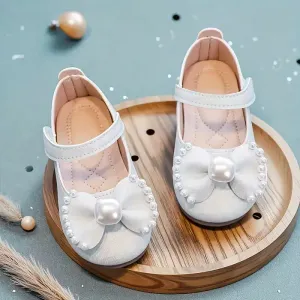 Paire de mocassins unis pour filles, ornés d'un nœud papillon